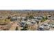 Panoramic aerial view of the complex showcasing mature trees and distant city skyline at 1830 Newland Ct # 319, Lakewood, CO 80214