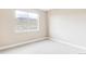 Bedroom with a window and carpet at 2125 S Orion St, Lakewood, CO 80228