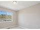 Bedroom with carpet floors and mountain view at 2125 S Orion St, Lakewood, CO 80228