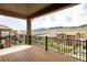 Relax on this lovely deck with views of the mountains and surrounding neighborhood at 2125 S Orion St, Lakewood, CO 80228