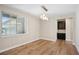Dining area with hardwood floors and window at 2125 S Orion St, Lakewood, CO 80228