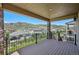 Covered deck with mountain views at 2125 S Orion St, Lakewood, CO 80228