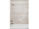 Close-up of luxurious shower and tub combo featuring sleek hardware and tile at 2125 S Orion St, Lakewood, CO 80228