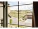 Beautiful view of rolling hills and neighborhood seen through window at 2125 S Orion St, Lakewood, CO 80228