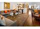 Inviting living room with hardwood floors, decorative shelves, and a large comfortable couch at 402 Garfield St, Denver, CO 80206
