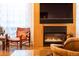 Inviting fireplace with elegant decor and comfortable chair at 402 Garfield St, Denver, CO 80206