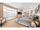 Bright main bedroom featuring plush bedding, large windows and contemporary decor for a relaxing retreat at 402 Garfield St, Denver, CO 80206