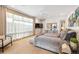 Spacious main bedroom with large window, custom drapes and elegant decor at 402 Garfield St, Denver, CO 80206