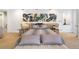 Beautiful bedroom with soft, neutral tones, stylish bedding and elegant decorative accents for comfort at 402 Garfield St, Denver, CO 80206