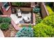 Private outdoor patio featuring comfortable seating and mature landscaping at 402 Garfield St, Denver, CO 80206
