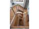 Modern staircase with wooden steps, metal railings, and ample natural light at 402 Garfield St, Denver, CO 80206