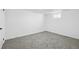 Carpeted basement bedroom with natural light from a good-sized window at 6894 Nelson St, Arvada, CO 80004