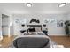 Serene bedroom with neutral tones, ample natural light, and light wood flooring at 6894 Nelson St, Arvada, CO 80004