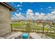 Relaxing balcony featuring scenic views, lounge chairs, and a cozy atmosphere at 21345 E 59Th Dr, Aurora, CO 80019