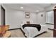 This basement bedroom has a clean modern look with recessed lights at 21345 E 59Th Dr, Aurora, CO 80019