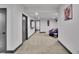 Spacious basement featuring neutral colors, plush carpeting, and a cozy beanbag chair at 21345 E 59Th Dr, Aurora, CO 80019