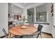 Cozy dining area adjacent to the kitchen with large window views at 21345 E 59Th Dr, Aurora, CO 80019