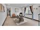 Comfortable living room with modern decor and neutral color scheme at 21345 E 59Th Dr, Aurora, CO 80019