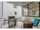 Outdoor patio space with a grill, seating, and view to the outside at 21345 E 59Th Dr, Aurora, CO 80019