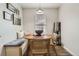 Charming breakfast nook with bench seating and window views at 3141 S Tamarac Dr # 202E, Denver, CO 80231