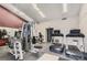 Fitness center featuring treadmills, weight machines, and other exercise equipment for residents at 3141 S Tamarac Dr # 202E, Denver, CO 80231