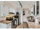 Updated kitchen with stainless steel appliances and stylish countertops at 3141 S Tamarac Dr # 202E, Denver, CO 80231