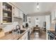 Updated kitchen flowing into breakfast nook area at 3141 S Tamarac Dr # 202E, Denver, CO 80231