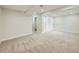 Spacious basement with neutral carpet and ample lighting offers flexible living space at 4591 S Fairplay St, Aurora, CO 80015