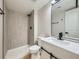 Bathroom showcasing modern fixtures, a walk-in shower, and a stylish vanity at 4591 S Fairplay St, Aurora, CO 80015