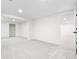 Large basement area with new carpet, recessed lighting, and closet for storage or customization at 6142 Dudley Ct, Arvada, CO 80004