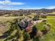 Majestic estate features lush landscaping and a detached garage with plenty of privacy at 3891 Windchant Cir, Castle Rock, CO 80104