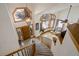 Grand entryway with high ceilings, natural light, and a staircase leading to the upper level at 3891 Windchant Cir, Castle Rock, CO 80104