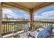 Relaxing balcony space with outdoor seating and neighborhood views at 8976 Fox Dr # 101, Thornton, CO 80260
