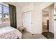 Cozy bedroom showcasing soft carpet, closet, and a relaxing ambiance at 8976 Fox Dr # 101, Thornton, CO 80260