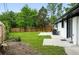 A well-kept backyard featuring lush lawn, privacy fence, and a patio area, great for outdoor relaxation and entertainment at 10320 W 35Th Ave, Wheat Ridge, CO 80033