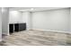Spacious finished basement features recessed lighting, neutral paint and stylish wood-look vinyl flooring at 10320 W 35Th Ave, Wheat Ridge, CO 80033