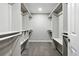 Open walk-in closet boasts ample shelving on both sides for organized storage and accessibility at 10320 W 35Th Ave, Wheat Ridge, CO 80033