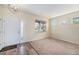 Inviting entryway with natural light from windows and stylish chandelier at 6147 N Flanders St, Aurora, CO 80019