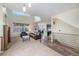 Open concept living space showcasing natural light, modern finishes, and stylish furniture at 6147 N Flanders St, Aurora, CO 80019