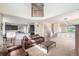 Bright living space featuring an open layout connecting to the kitchen and stairway at 6147 N Flanders St, Aurora, CO 80019