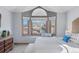 Bright bedroom featuring a window seat and gray walls at 16234 E Belleview Dr, Centennial, CO 80015