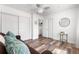 This flexible bedroom features a comfortable couch, a closet, and great natural light at 6604 S Dahlia Cir, Centennial, CO 80121