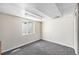 Simple room with neutral carpet and single window for natural light at 8244 Clemson Ln, Westminster, CO 80031