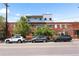 Facade of mixed use commercial and residential real estate investment property in Denver, CO at 3033 Blake St # 109, Denver, CO 80205