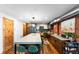 Spacious kitchen featuring a large island, stainless steel appliances, and modern fixtures at 3033 Blake St # 109, Denver, CO 80205