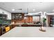 Spacious kitchen with stainless steel appliances, granite countertops, and a stylish backsplash at 3033 Blake St # 109, Denver, CO 80205
