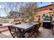 Outdoor patio featuring a dining area, lounge seating, and grill at 3033 Blake St # 109, Denver, CO 80205