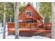 A-frame cabin in the woods with large deck and hot tub at 381 Lake Rd, Idaho Springs, CO 80452