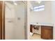Bathroom with shower and single sink vanity at 6930 Warren Dr, Denver, CO 80221