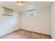 The room features neutral carpet, white walls, and a window at 6930 Warren Dr, Denver, CO 80221